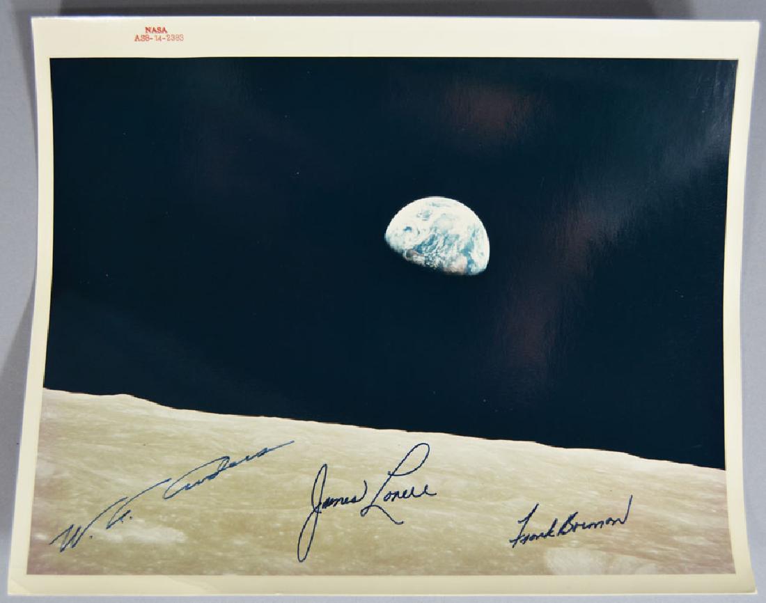 W.A. Anders, James Lovell and Frank Borman Autographed: 8x10 color, NASA AS8-14-2383, from the National Aeronautics and Space Administration Houston, Texas, possibly autopen. Provenance: Collection of Lt. Col. Walter Pennino (1915-1998) who was the directo