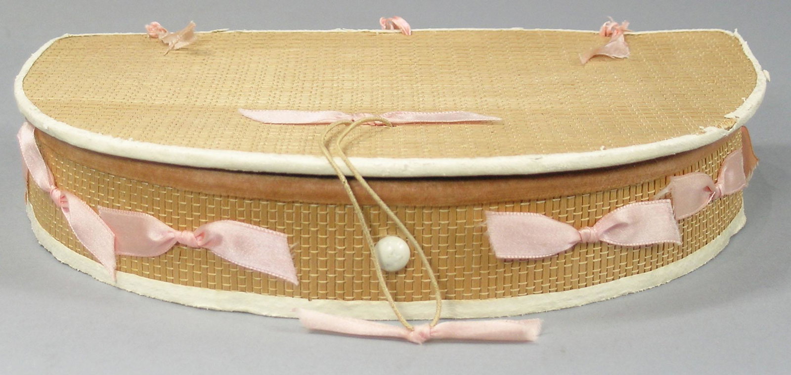 Alfred, Maine Poplarware Dresser Box: half round, pink velvet lining, having six sections, 6" D., 9" L., 1 3/4" H.