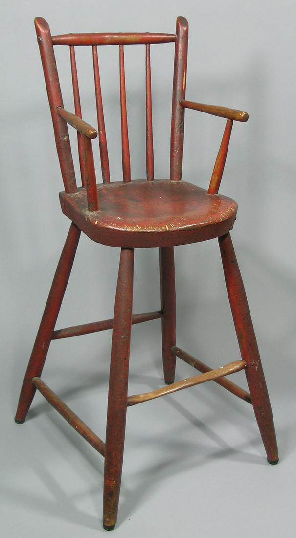 Early 19th C. Windsor High Chair: shaped seat, remnants of original red paint throughout, 20 1/2" seat height, 31 3/4" H. overall.