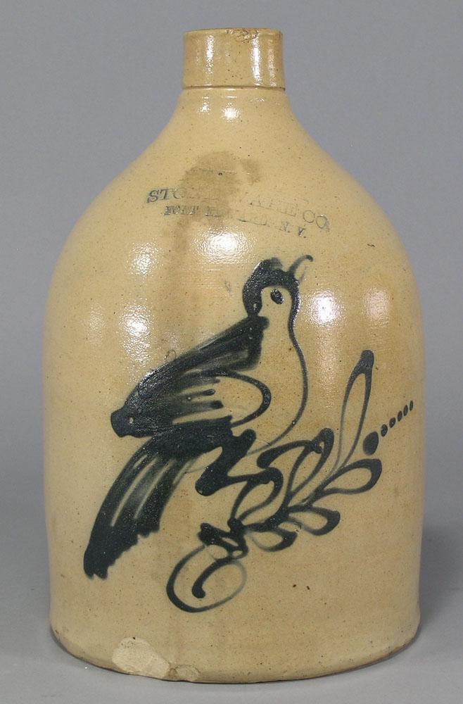 New York Stoneware Co. Decorated Jug: Fort Edward, NY, having a dark cobalt bird decoration, 11 3/8" H.