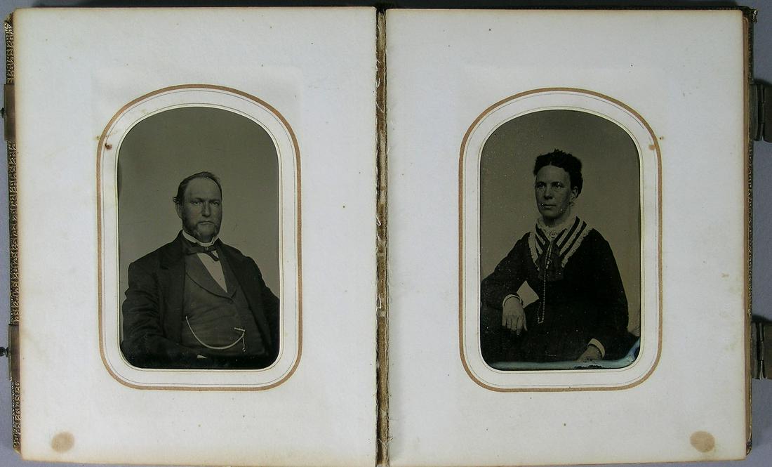 Victorian Photograph Album: full leather covers, containing 34 images comprising 14 tintypes, 17 CDV's and 3 photographs, album measures 6 1/4" x 5"