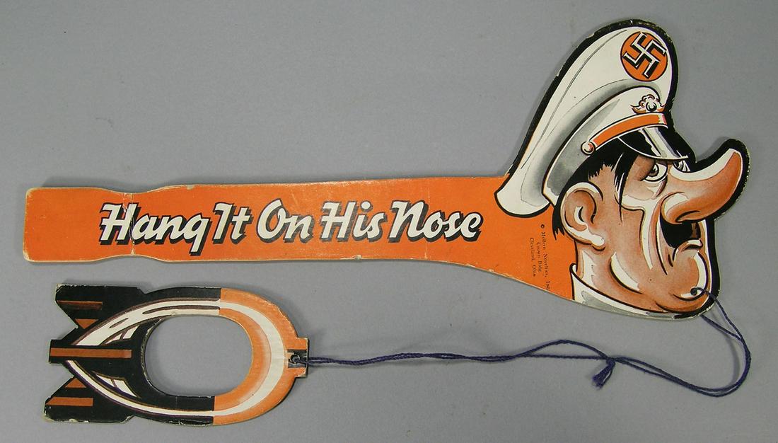 Anti Hitler Hang It On His Nose Ring Toss Game: paperboard, made during World War II by Modern Novelties, Inc. Cleveland, Ohio, 13 3/4" L.