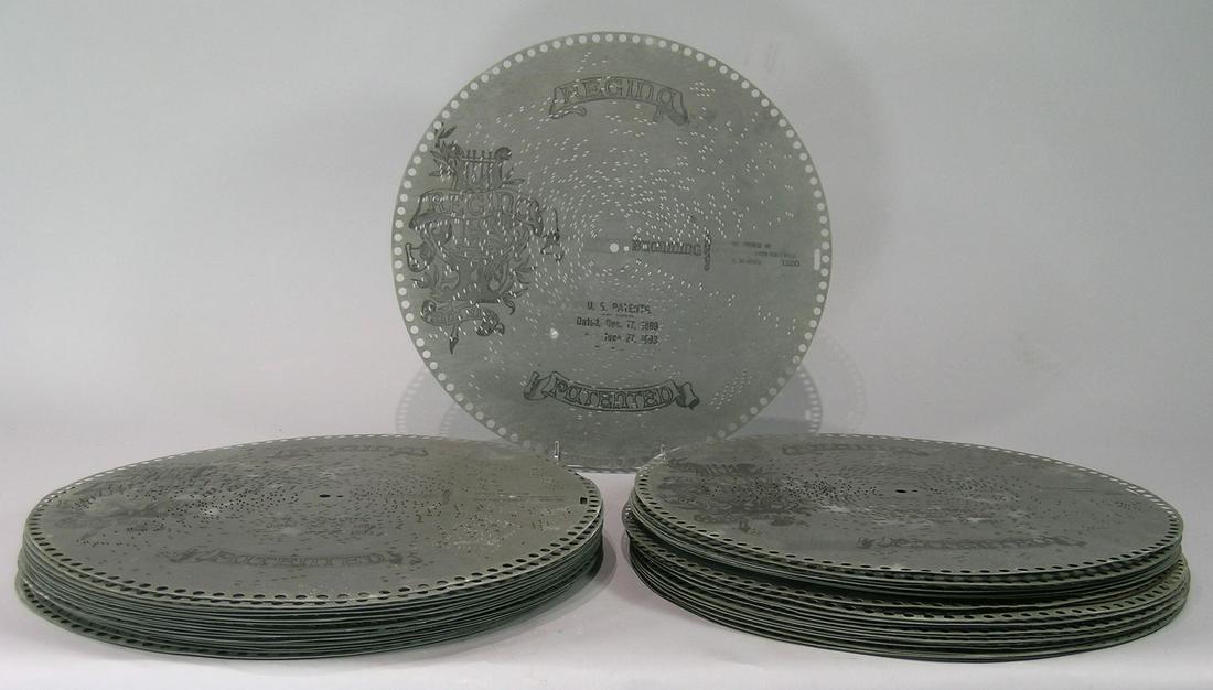 Collection of 45 Regina Music Box Disks: all 15 1/2". A list of the title and number on each disk is available upon request.