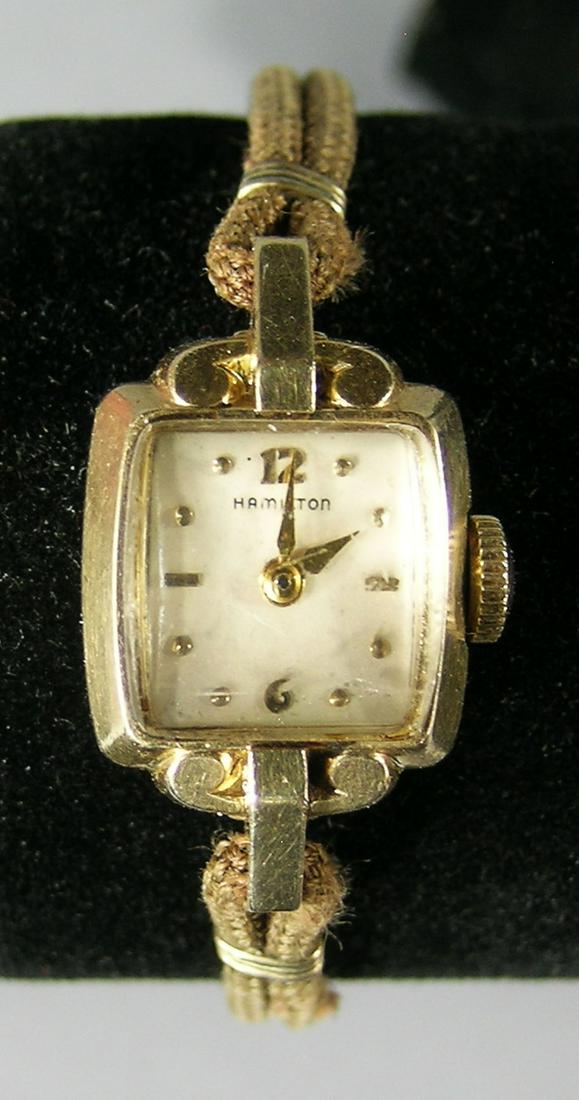 Ladies Hamilton 14k Wrist Watch: bearing the inscription In Appreciation To Raymond N. Peck Quarter Century Club April 22, 1954 Pratt & Whitney Aircraft, having a woven two strand band.