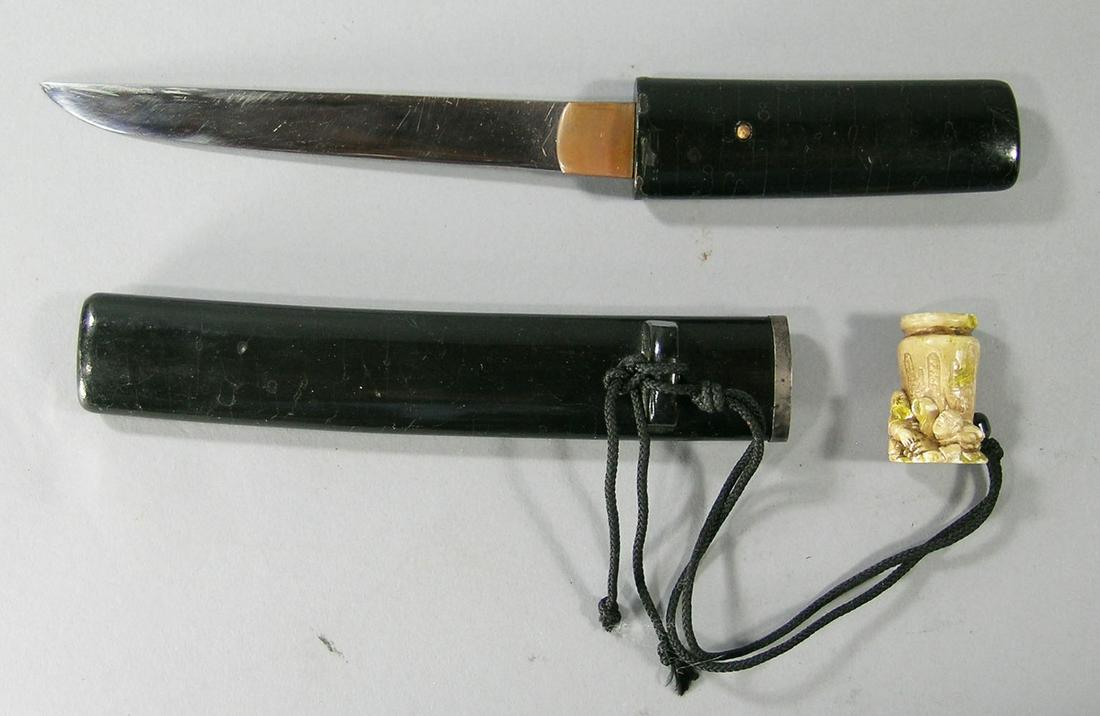 Antique Japanese Tanto: wooden handle and sheath, 6" long blade, having makers stamp on tang