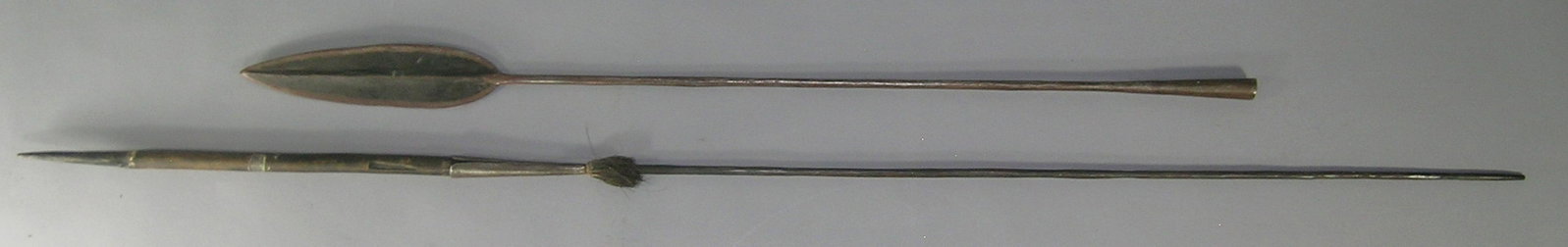 African Samburu Hunting Spear: hand forged iron leaf shaped spear tip, wooden central section and having a hand forged round iron handle with a band of animal hair decoration, 83" L. overall. Provenance: From a Private Collector in