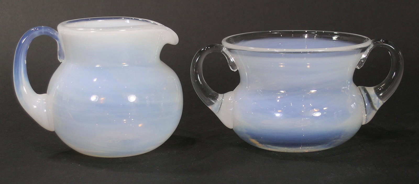 PAIRPOINT GLASS SUGAR BOWL AND CREAMER: opalescent, sugar bowl 2 3/4" high, creamer 3 3/8" high