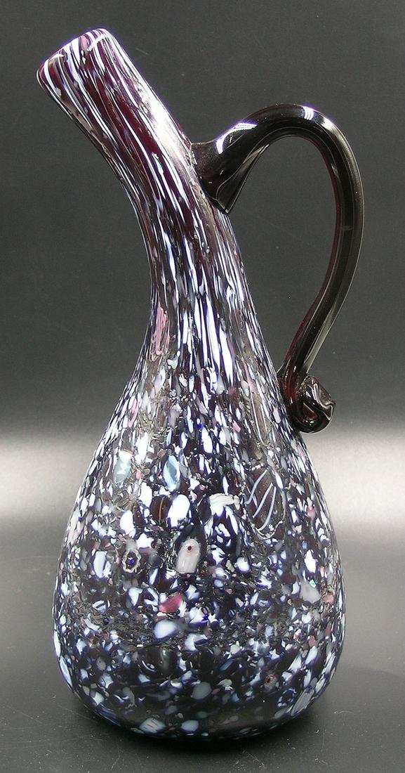 BRYDEN PAIRPOINT GLASS ENAMELWARE EWER: deep ruby with polychrome cane and frit rolled-on decoration, gourd form, 4" dia. at base, 9" high, having a Gundersen Masterpiece label attached to the underside. Note: Former Allen Collection