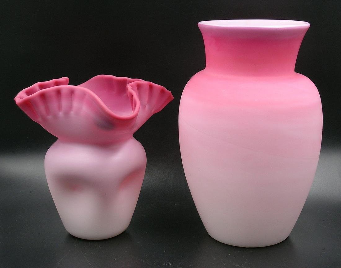 TWO PAIRPOINT PEACHBLOW GLASS VASES: one having a pinch body with a ruffled rim, 5 1/2" high, and one being of shouldered tapering form, 4 1/2" dia., 7 1/2" high Provenance: Both formerly from the F. and P. Rindge Collection