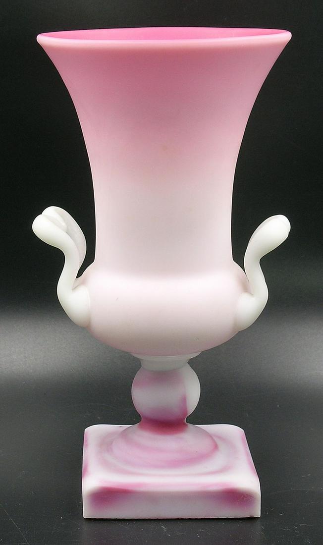 PAIRPOINT PEACHBLOW GLASS URN FORM VASE: on a square mottled base, 4 3/8" dia., 8 3/8" high Provenance: Formerly from the F. and P. Rindge Collection