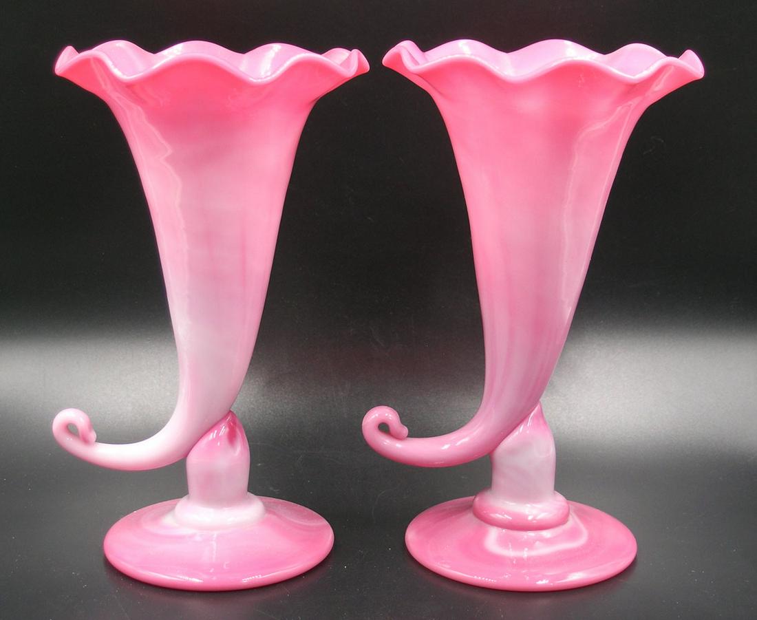 PAIR OF PEACHBLOW GLASS CORNUCOPIA VASES: gloss finish, 6 3/4" high, unfinished pontils. Provenance: Both formerly from the F. and P. Rindge Collection
