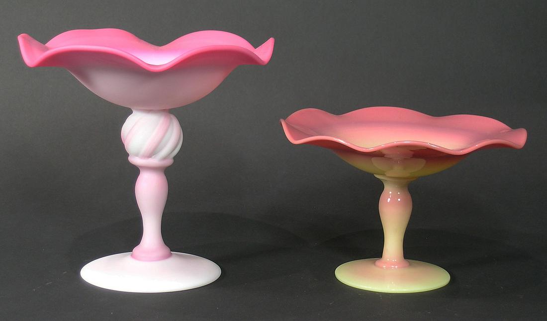 TWO MT. WASHINGTON/PAIRPOINT GLASS COMPORTS: both having ruffled rims, one Burmese, 7" dia., 4 1/2" high, with polished pontil, and a Peachblow with a twist ball on the upper portion of the pedestal, 7" dia., 6 3/4" high, with unfinished pontil