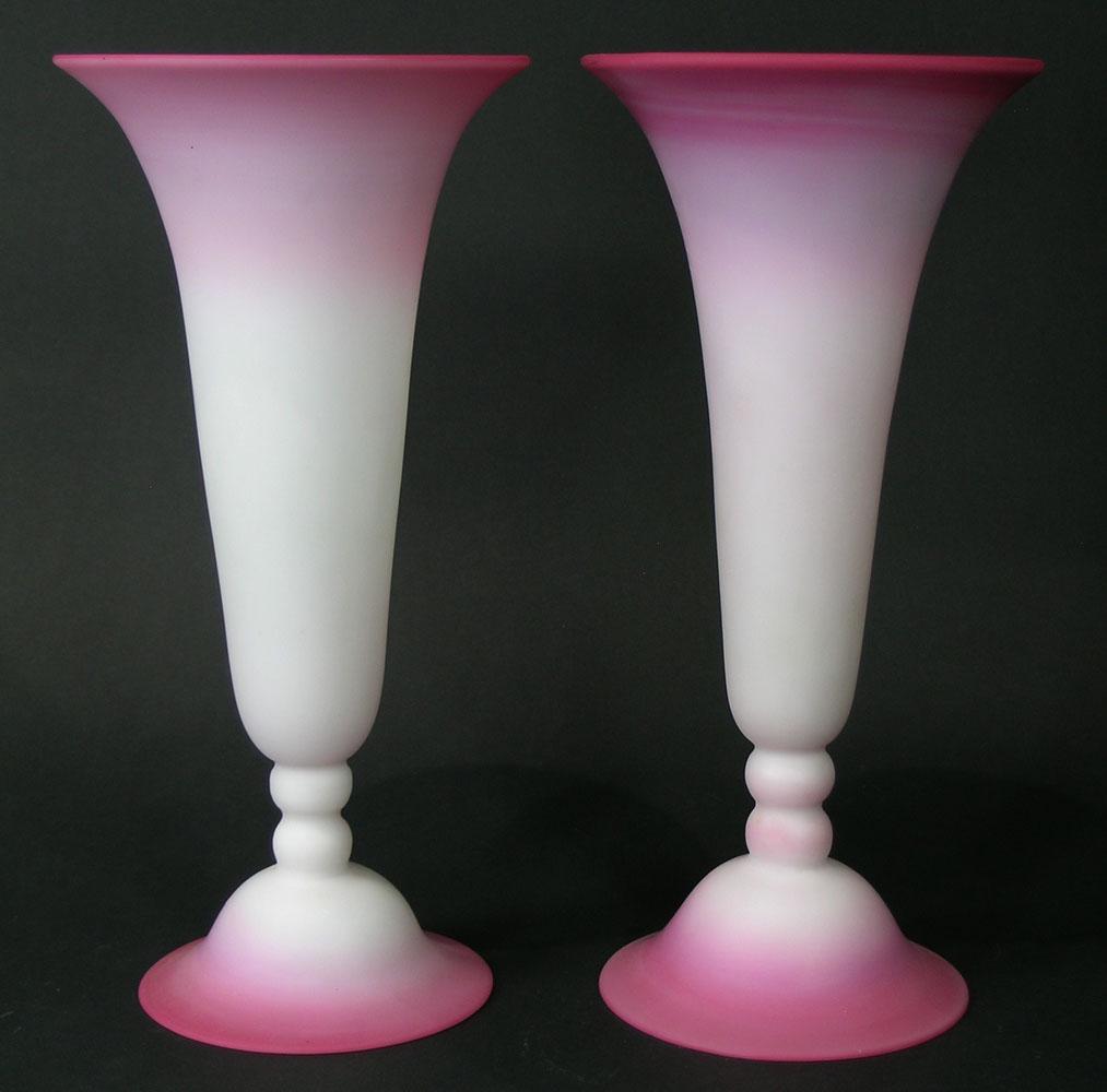 A PAIR OF PAIRPOINT PEACHBLOW GLASS TRUMPET VASES: having a two ball stem over a domed base, 5 3/4" dia., 12" high