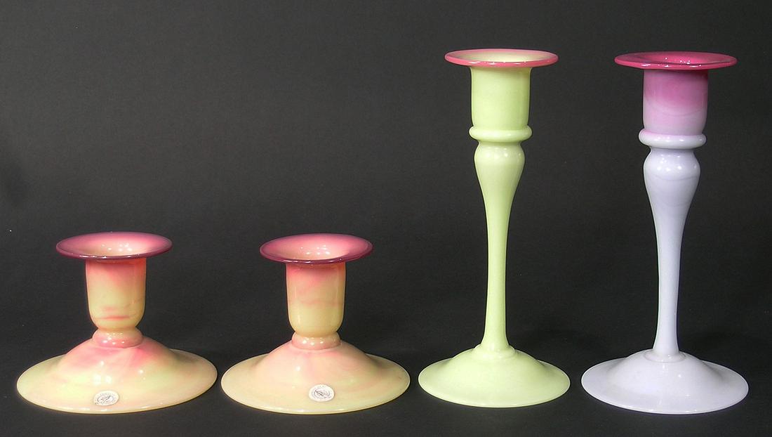 FOUR PAIRPOINT GLASS CANDLESTICKS: all gloss finish, comprising a pair of Burmese glass low candlesticks, 3" high, and tow tall candlesticks, one Burmese glass and one Peachblow, both 6 3/4" high.