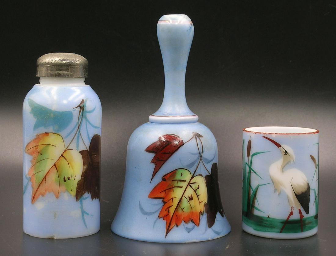 THREE SMITH BROTHERS MILK GLASS ITEMS: all hand decorated, comprising a painted blue shaker and a bell both having fall maple leaves, and a painted blue toothpick holder with a Heron and cattails