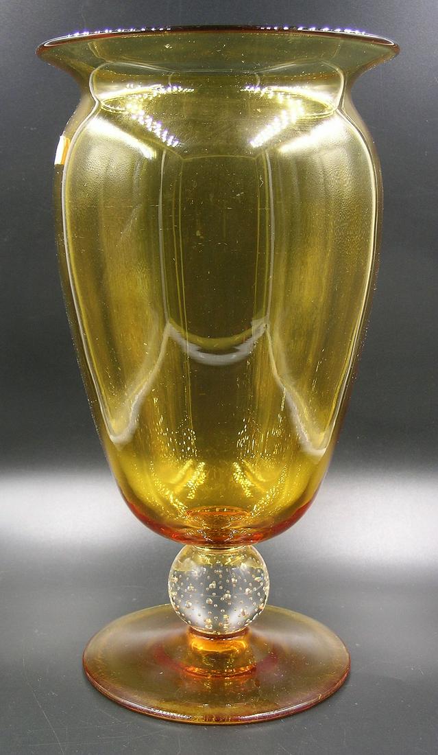 GUNDERSEN MASTERPIECE GLASS VASE: Vase #B-1107, having an Auroria optic ribbed tapering body, over a ball standard having controlled air bubbles, over an Auroria base, polished pontil, 5 1/2" dia., 11 1/4" high, having original silver
