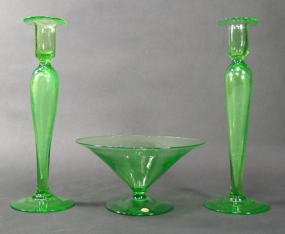 THREE PIECE PAIRPOINT GLASS CONSOLE SET: Green glass, comprising a footed center bowl, 8" dia. 4" high, and a pair of candlesticks #1600, all having finished pontils, 12" high