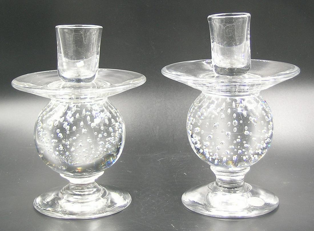 PAIR OF PAIRPOINT GLASS CANDLESTICKS: colorless glass, having a flaring bobeche over ball form stem with controlled air bubbles, unfinished pontils, 4" dia., 5 1/2" high