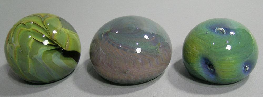 THREE SALAMANDRA ART GLASS PAPERWEIGHTS: all are signed, and are dated 11/75, 12/75 and 11/76, the largest is 3 1/4" dia.
