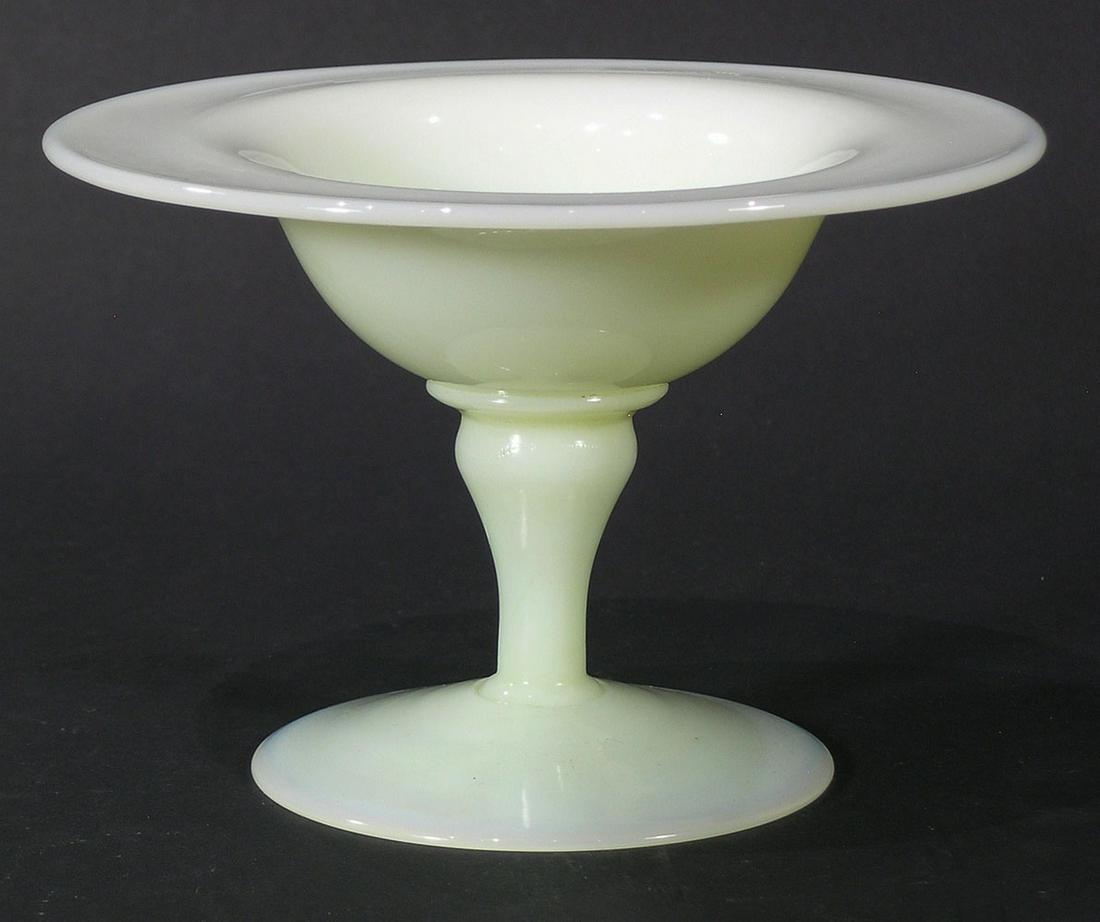 PAIRPOINT ART GLASS COMPORT: alabaster, 6" dia., 4" high, having the original round paper label on underside of base