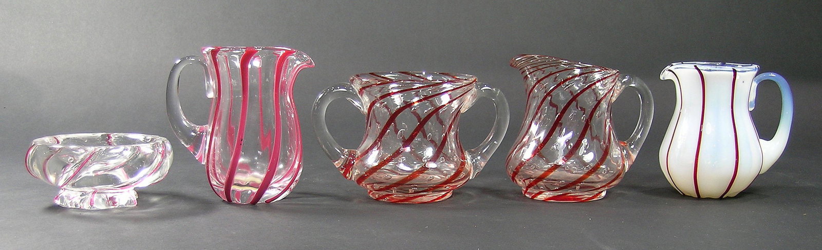 FIVE PAIRPOINT GLASS CREAMERS AND SUGAR BOWLS (1 of 1)