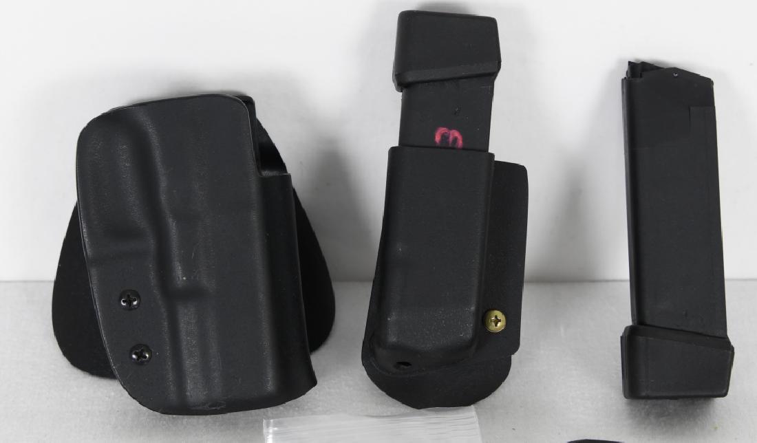 Glock 19 Accessory lot Mags & Holster: Kydex paddle holster, moulded mag holster, 3 factory hi cap 15 rd mags, and 1 10 round mag 9MM and 3 mag loaders.