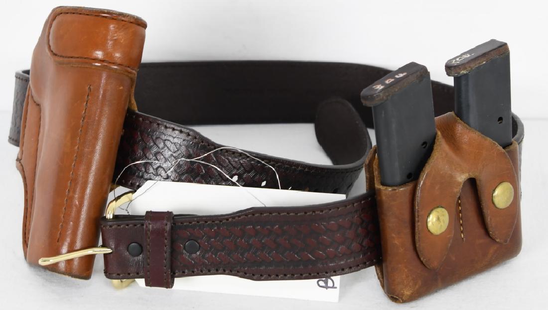 Top Grain leather Belt 38" w/ leather magazine hol: holder and 2 mags and Milt Sparks pistol holster, Heavy duty and in super nice condition, the leather belt is hand engraved design and may have been worn once! you can remove the buckle and replace it