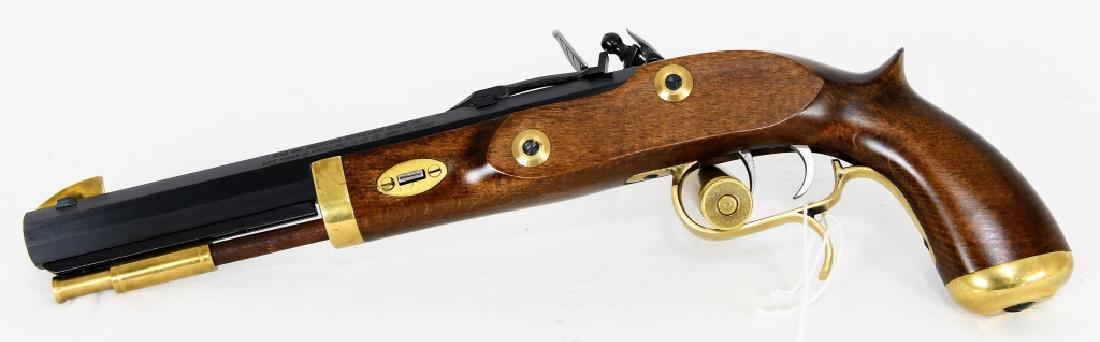 Traditions Trapper .50 Cal Black Powder Pistol: Excellent condition Trapper Pistol .50 cal Flintlock Select Hardwood/Blued P1090. Most of the early mountain men and traders carried a single-barreled pistol and they were popular for years. These pis