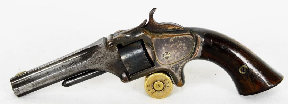 Antique Smith & Wesson Model 1 2nd Issue Tip up: Up for sale is a Smith & Wesson Model Number 1 2 Second issue Revolver 22 Cal. Rimfire with 3 1/4 inch octagon Barrel with serial no. 50926. Smith & Wesson manufactured 114,900 of these revolvers betw