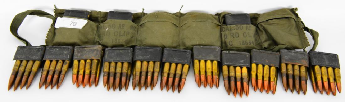 Lot of 17 Loaded M1 Garand Clips W/Bandoleer: Here we have 17 fully loaded clips for your M1 Garand, Variet of ammo, most in the Bandoleer are Armor Piercing AP rounds