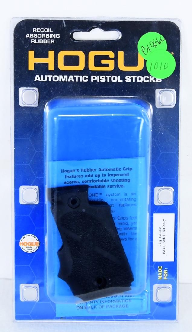 Hogue Automatic Pistol Stocks New Sig Sauer P238: New in the package is HOGUE automatic Pistol Stocks for a Sig Sauer P238 these feature Ambi Safety for the .380 acp, the grip is made from soft rubber, the monogrip securely wraps around the gun frame