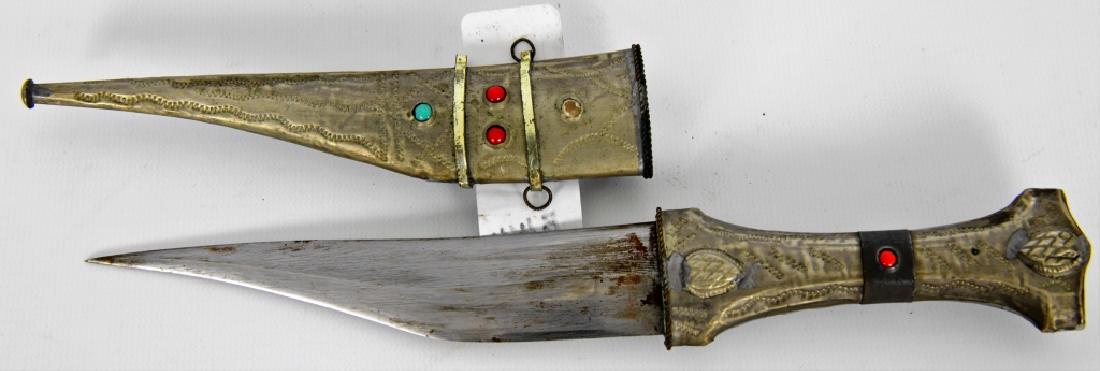 FANTASY style Knife / Dagger with Sheath: Here is an odd Fantasy style knife / Dagger with matching sheath, very interesting dagger, metal handle and sheath with embossed design comes with beads on the exterior, the blade measures approx 5.5"