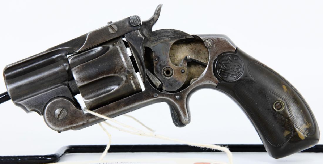 Antique Smith & Wesson .38 SA Revolver: ok, this one has me stumped... I believe it is a S&W Single action second model. This one has been around the block a time or two and only if it could tell a story... Well the barrel has been shortene