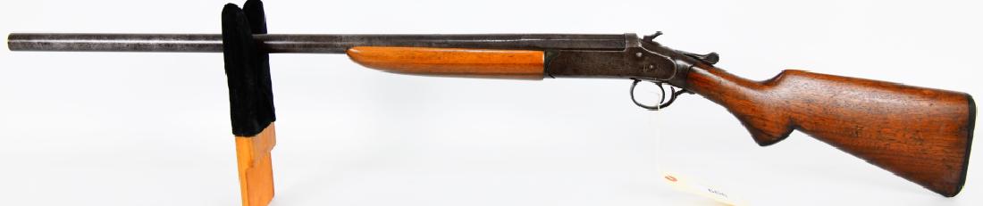 Iver Johnson Arms & Cycle Works Champion 12 Gauge: Up for auction is an old Iver Johnson Arms & Cycle Works Champion single shot shotgun chambered in 12 Gauge. Condition is poor, split wood and surface pitting present. 27" barrel. Serial # 409XX