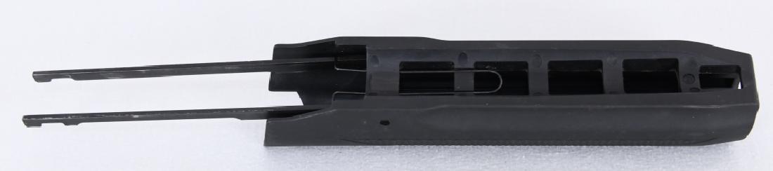 New Mossberg Slide poss for 500 Black Checkered: New in package is a Mossberg Slide possibly for the Mossberg 500 Black with nice checkering
