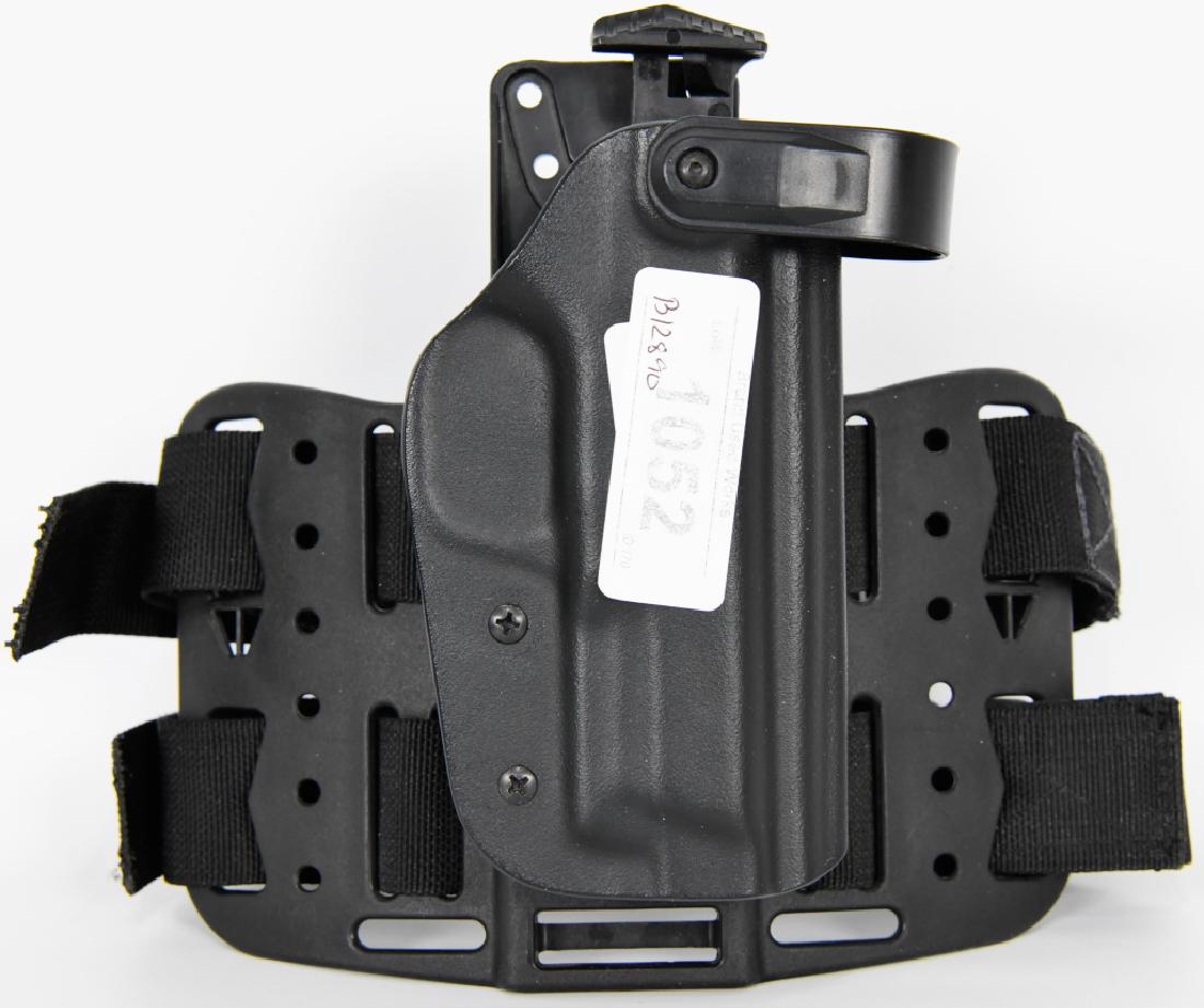 Blade Tech WRS Level II Duty Thigh Rig Holster - R: Blade-Tech WRS level II Duty Thigh Rig and Holster - Right Hand Blade-Tech( Weapon Retention System) has a spring-loaded hood that allows it to spring forward when released. To do so you push the leve