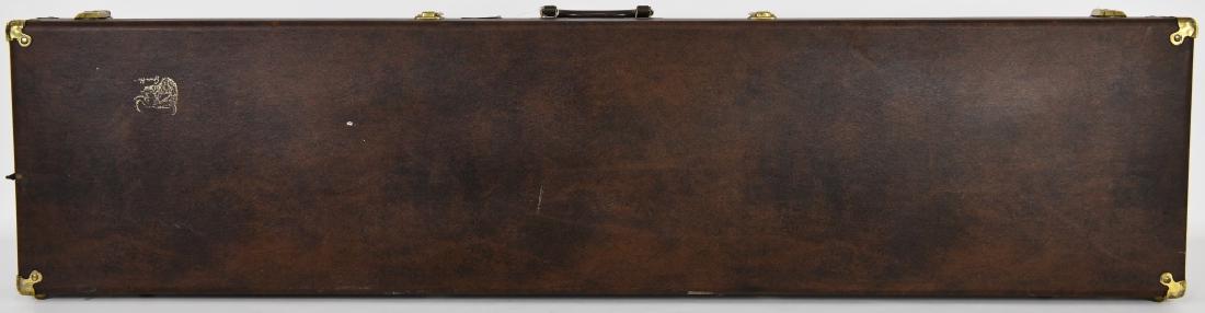 Padded and lined Rifle / SHotgun Brown 52"x12: Real nice padded and lined Rifle / Shotgun Hardcase measures approx 52"x12" comes with 4 latches (can lock but no key) A resin handle, and has brass covers to the corners, looks to be a brown vinyl co