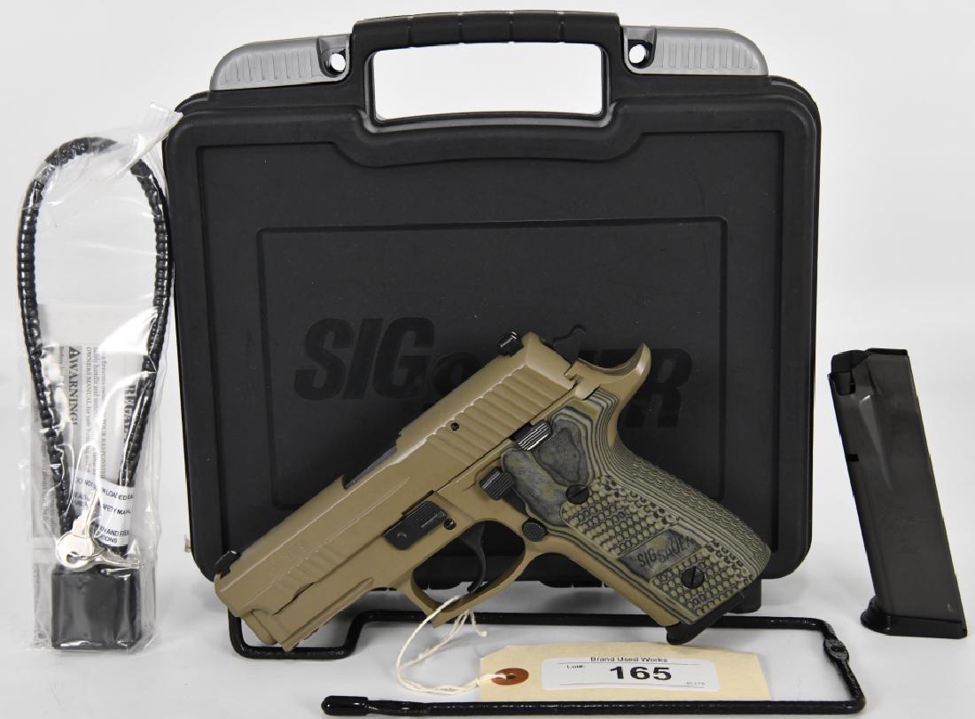 Sig Sauer P229 Elite Semi Auto Pistol .40 S&W: Up for auction is a super nice Sig Sauer P229 Elite semi automatic Pistol chambered in .40 S&W, yet another great conceal and carry weapon that comes with 2 extra mags that state Sig Sauer P229 .40 & 