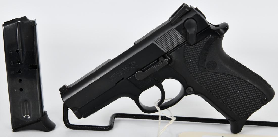 Smith & Wesson Model 6904 Semi Auto Pistol 9MM: Up next is a Smith & Wesson Model 6904 Semi Auto Pistol Chambered in 9MM , It comes with 2 - 12 round Magazines, Auto decocker, In Excellent pre-owned condition. Serial THD9436. This S&W is in great c