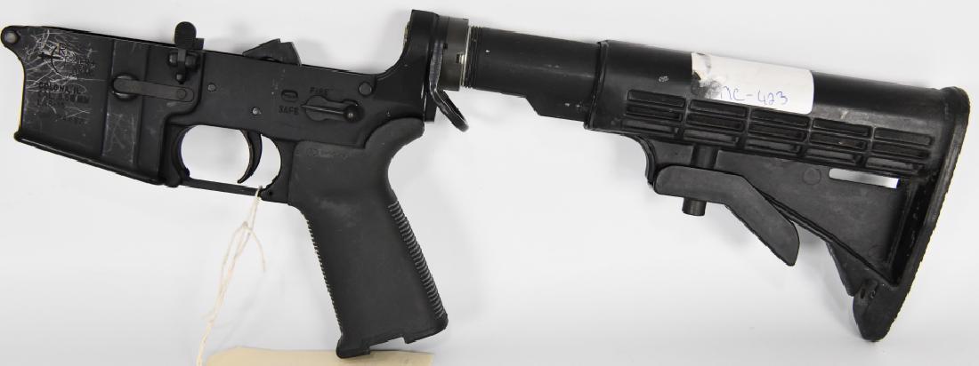 Complete Rock River LAR-15 Lower 5.56MM: Here we have a complete Rock River LAR-15 Lower Chambered in 5.56MM. This lower comes with a Magpul grip and a Rock River adjustible rear stock and a rear sling ring.
