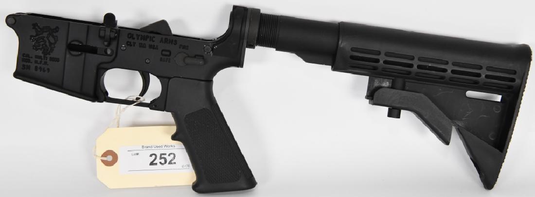 Olympic Arms AR-15 Lower Model MFR Multi cal 2005: Great looking lower by Olympic Arms Model MFR and caliber is marked Multi 2005, Serial SM8969. Fitted with a adjustible rear stock.