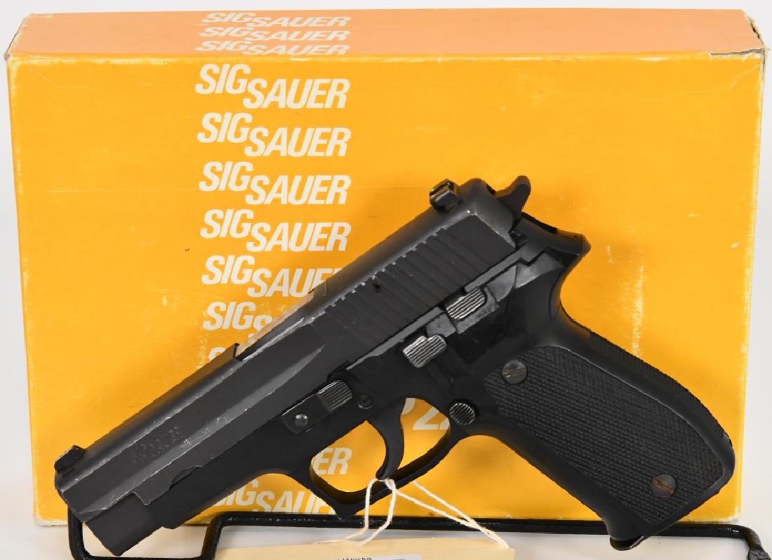 Sig Sauer P226 Semi Auto 9MM Pistol Germany: Here is a beautiful Vintage Sig Sauer P226 Semi Auto Pistol Chambered in 9MM and made in Germany, This pre-owned baby is in Excellent condition and comes in the original factory box and includes one f