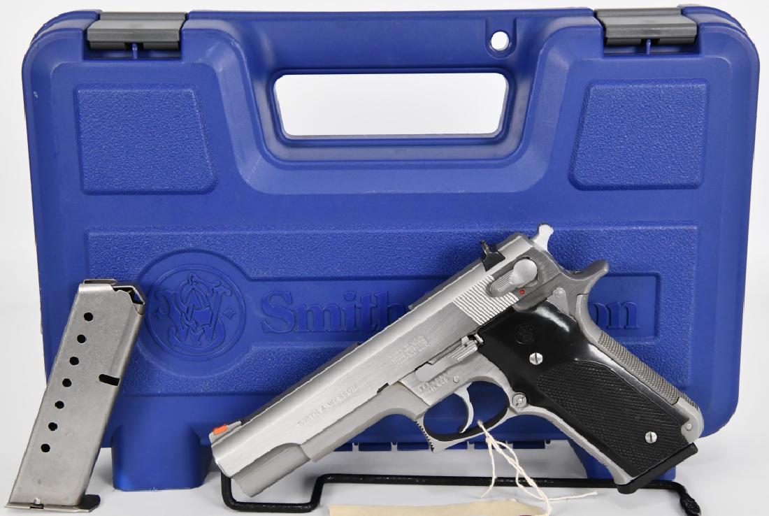 Smith & Wesson Model 645 Semi Auto Pistol .45 ACP: Up Next is a Smith & Wesson Model 645 Semi Auto Pistol Chambered in .45 ACP. It comes with 2 magazines and a blue S&W hardcase. The pistol appears in excellent condition. Serial # TAZ4620