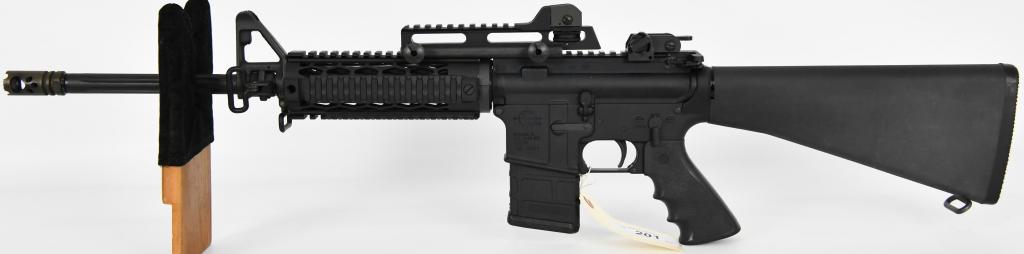 Rock River Arms LAR-15 5.56 NATO AR-15: Here we have a nice Rock River Arms LAR-15 Semi Auto Rifle Chambered in 5.56 NATO, Fluted heavy barrel, Flash hider, YHM Yankee Hill Quad rail with Surefire rail covers, Hogue pistol grip, fixed butts