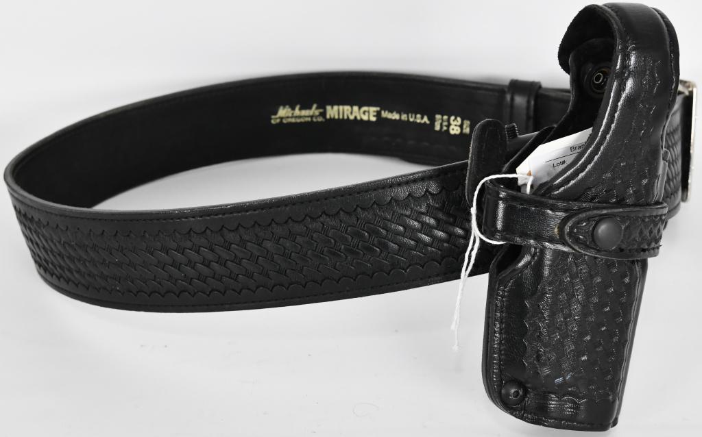 Michaels Mirage Leather gun Belt & Safariland Hols: Here is a super nice lot to get your bid on!!!! Michaels of Oregon "Mirage" black leather adjustable gun belt size 38 97 cm Made in USA comes with a Safariland P226 Leather Holster in super nice condi