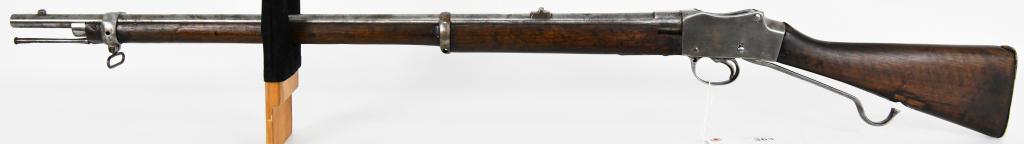 Martini Henry MK IV 1887 Enfield Rifle .577/450: Up for auction is a cool old antique Martini Henry MK IV 1887 Enfield Rifle Conversion. This Rifle is equiped with a bayonet lug, Rod, Cartouche marks, 33" barrel, and serial number appears to be 695.