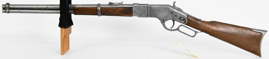 Winchester Model 73 Saddle Ring Movie Prop Gun: Up Next is a Winchester Model 73 Saddle Ring Carbine Movie Prop Gun. It is very realistic, weighted, looks and feels like the real deal. This required no background check. Maybe this was used by the D