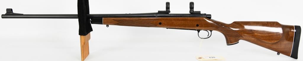 Engraved Remington Model 700 .338 Win Mag: Up Next is a Beautiful Remington Model 700BDL Custom Deluxe in .338 Winchester Mag, 24" Barrel, Hooded Front Sight, Topped with 2 pc. Base Mounts and Rings. This Rifle is Beautifully Engraved on the R