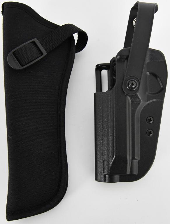 Lot of 2 Great Holsters- Both Uncle Mike's: one is Uncle Mike's Reflex Holster durable and heavy duty holster,this is a left hand sz 20 Function tested in mud, sand, water & extreme temperature Included belt loopattachment platform Made of inje