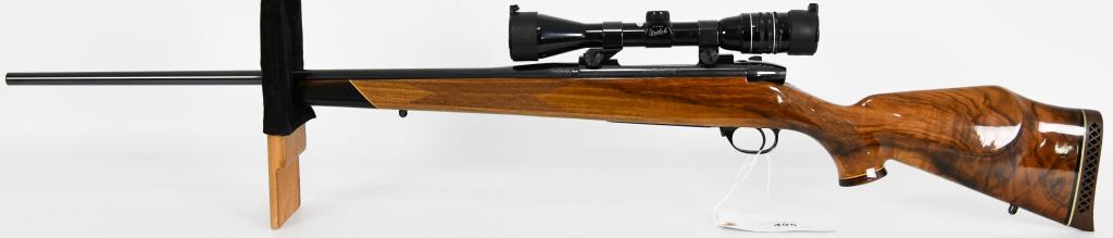 Weatherby Mark V .300 Weatherby Magnum W/ Scope: Up for auction is a Beautiful Weatherby Mark V made in Japan, Chambered in .300 Weatherby Magnum and topped with a Weatherby Premier 4X40 scope, This Bolt Action Beauty is in Excellent pre owned condi